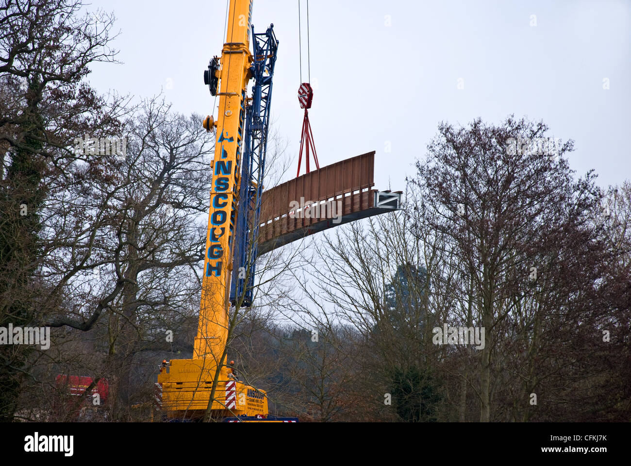 Crane operating with bridge parts Stock Photo Alamy