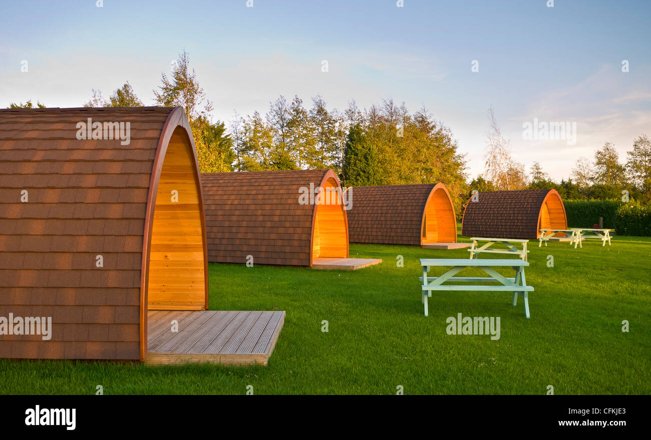 Wooden camping pods at Banham campsite in Norfolk. Stock Photo