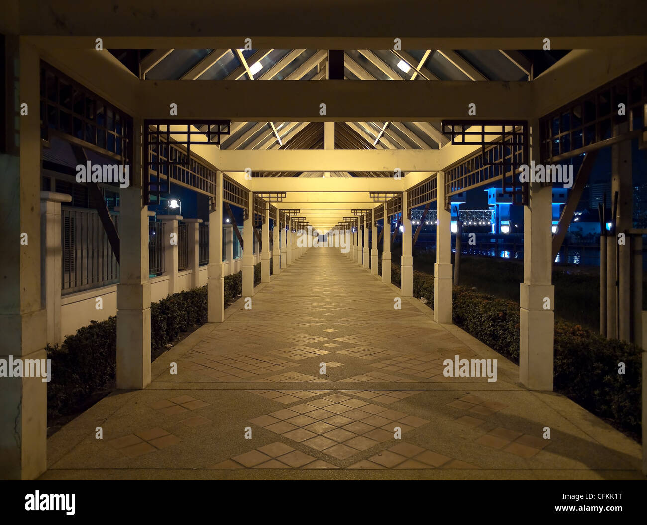 Alley through pavilion Stock Photo - Alamy