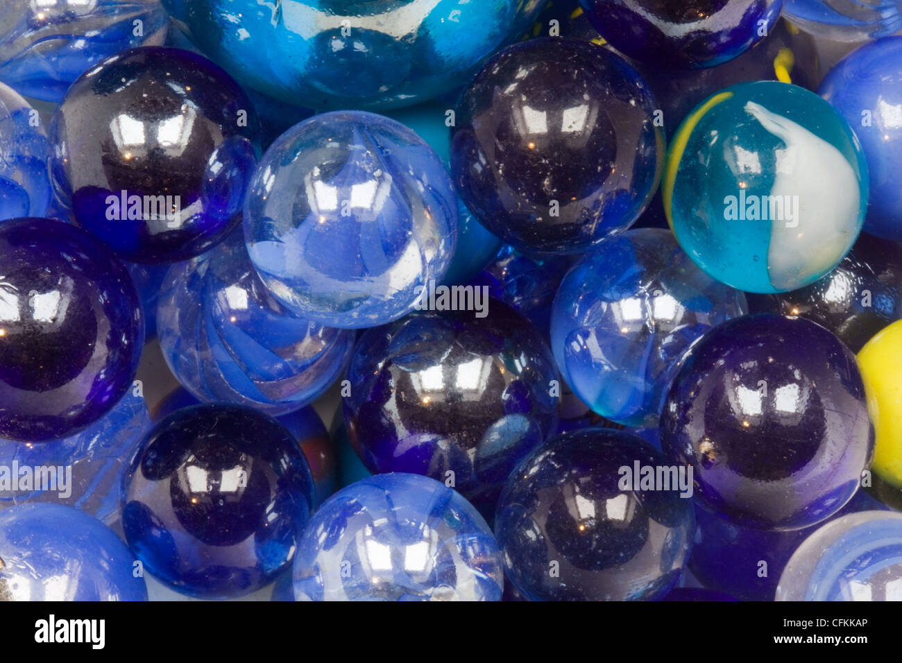 Blue glass marbles Stock Photo - Alamy