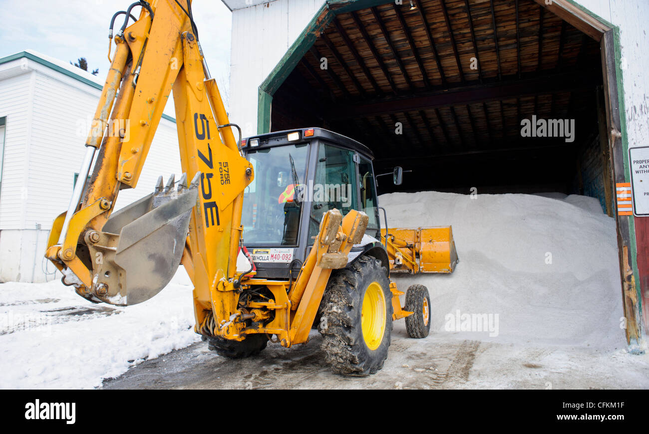 Front end loader loading road salt for deicing winter roads in Canada Stock Photo Alamy