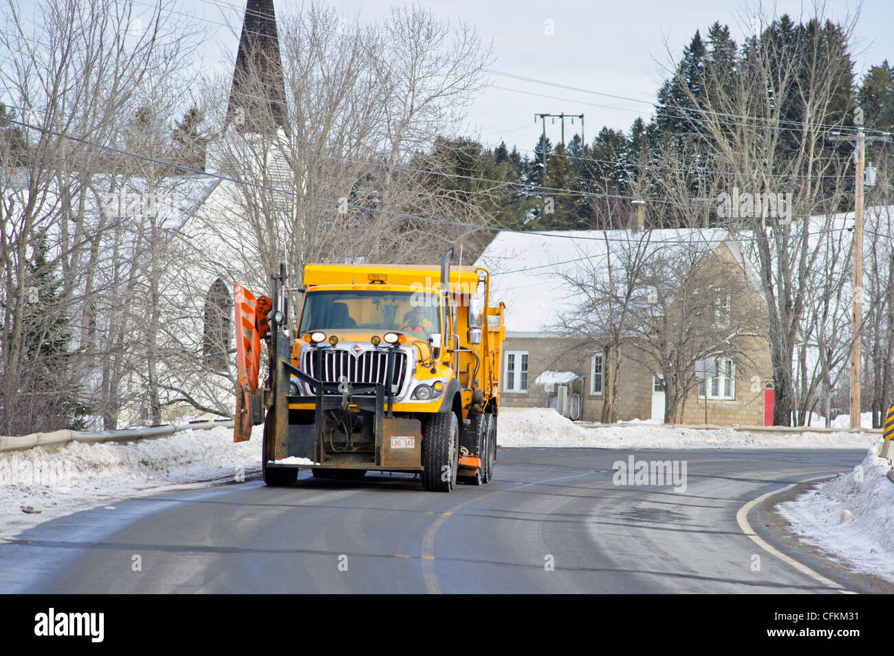 Snow plow heading out with a load of road salt Stock Photo Alamy