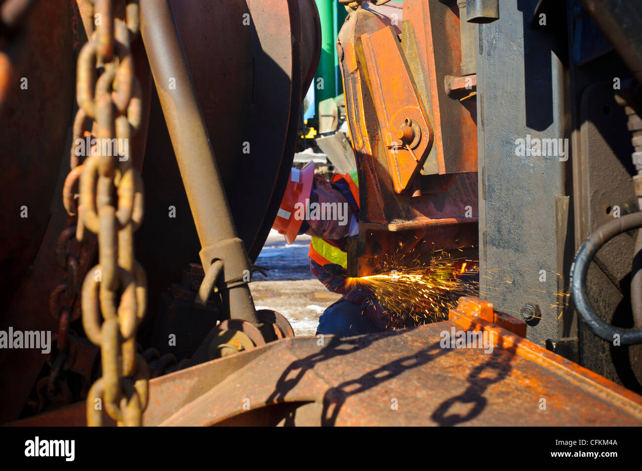 welder welding snow plow Stock Photo