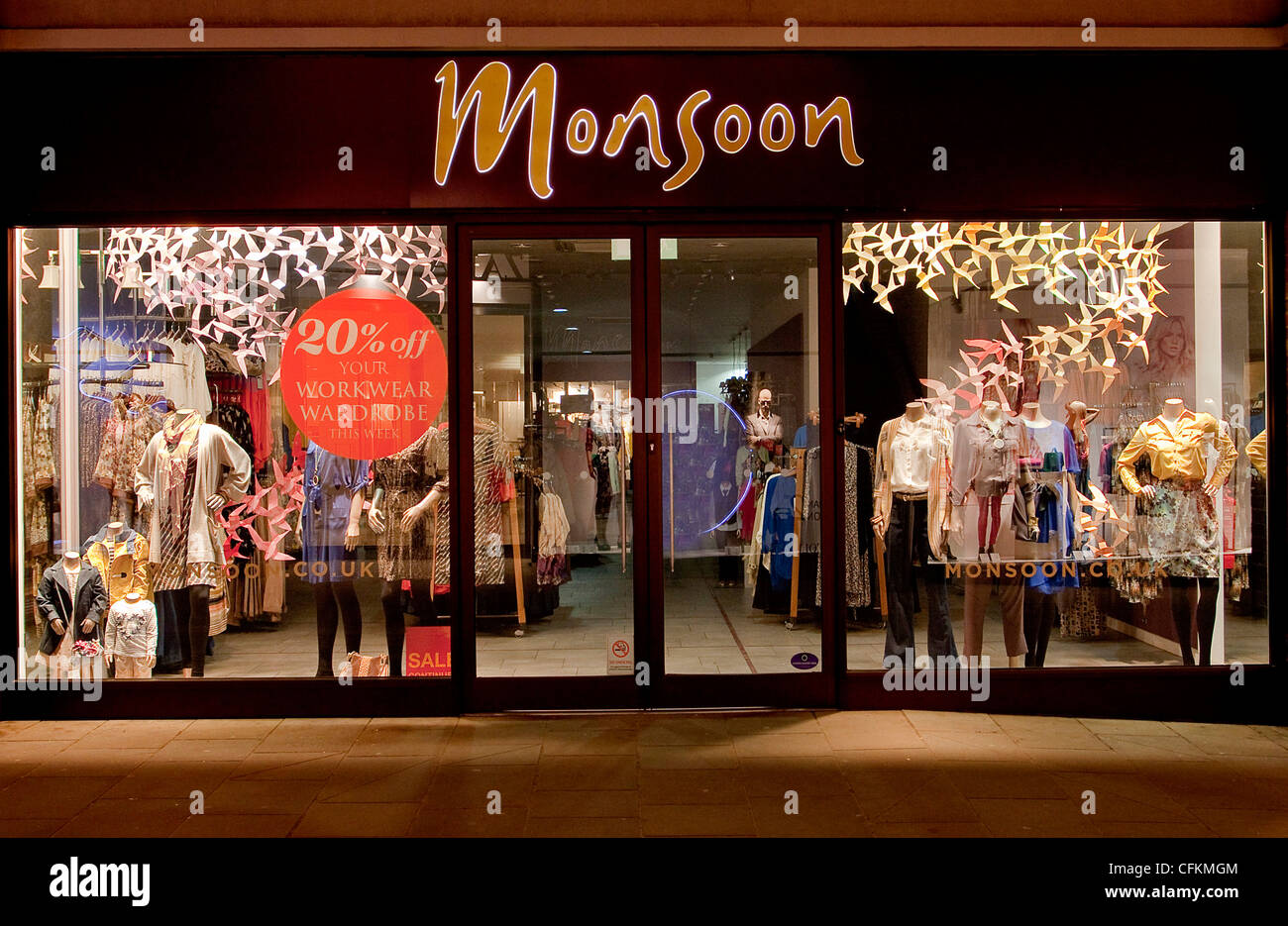 Monsoon Shop Store Illuminated Shop Window Display at night Canterbury Kent UK Stock Photo