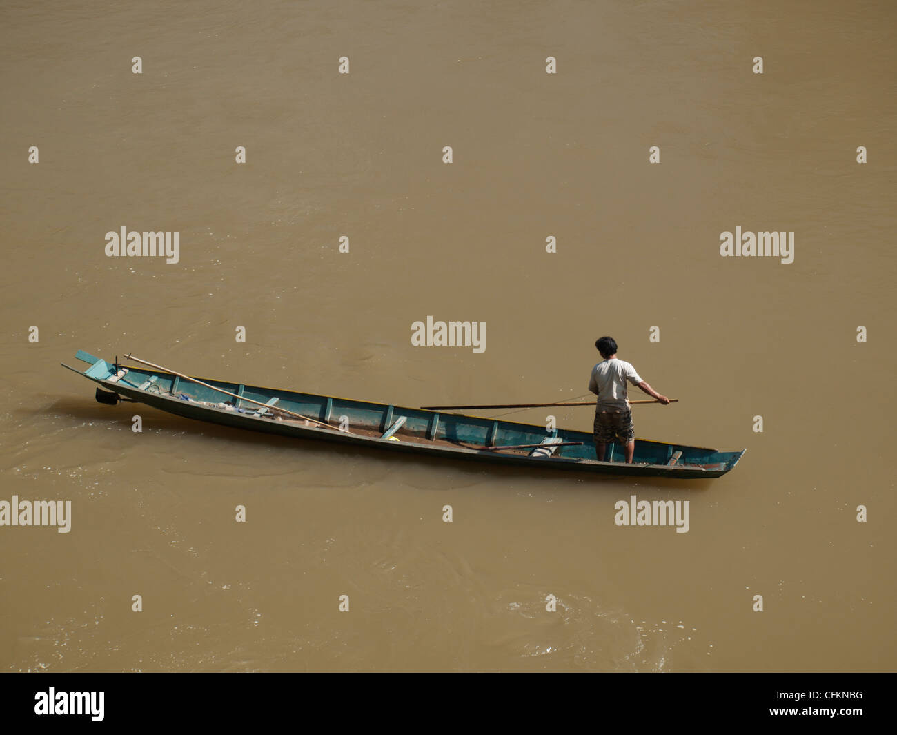 Fisherman on the mekong river Stock Photo