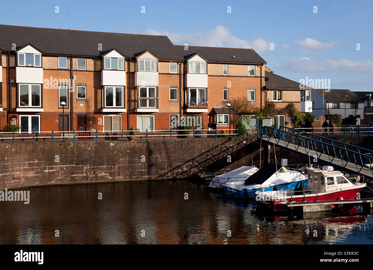 Moored boats and residential properties at Penarth Marina near Cardiff Bay Stock Photo