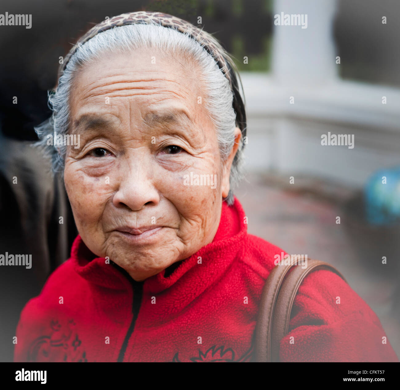 Portrait of elderly Lao woman with beautiful face in Luang Prabang, Laos Stock Photo