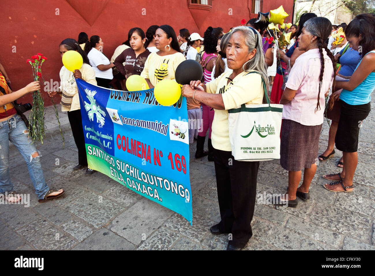 women who have benefitted from microfinance loans gather to celebrate 10th anniversary of Bancomunidad with march down Alcala Stock Photo