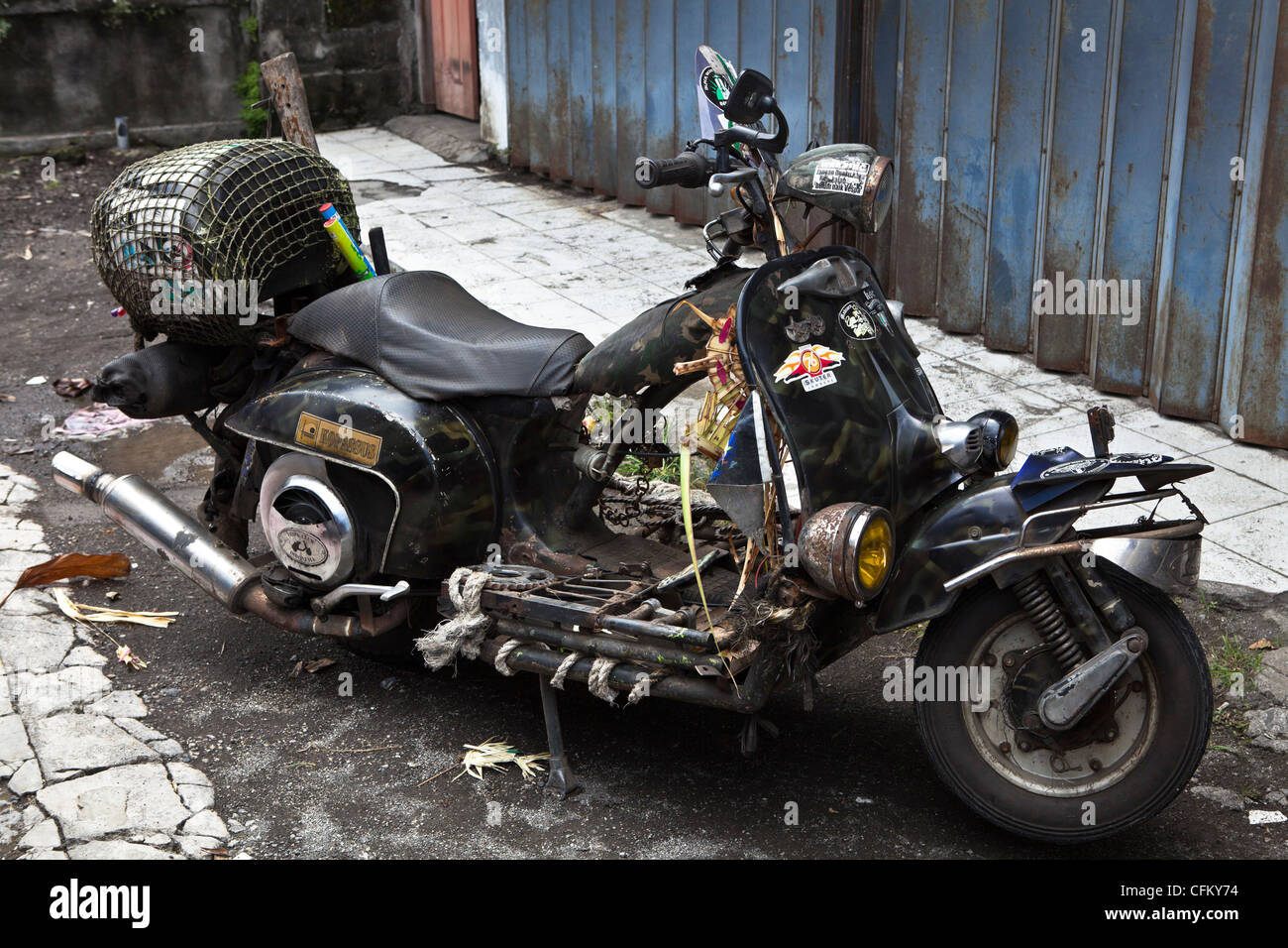 Old motorbike customized in a street. Ubud, Bali, South Pacific, Indonesia, Southeast Asia, Asia. Stock Photo