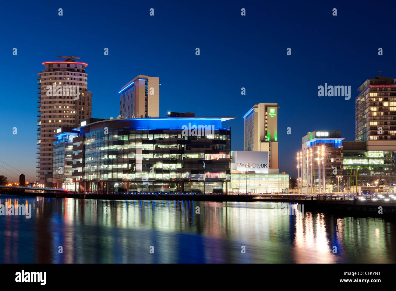 The BBC studios and offices at Media City near Salford Quays at night. Stock Photo