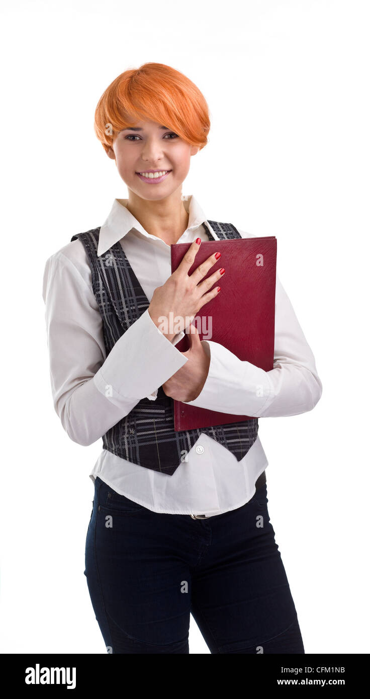 female university student smiling and carrying notebook - isolated over a white background Stock Photo