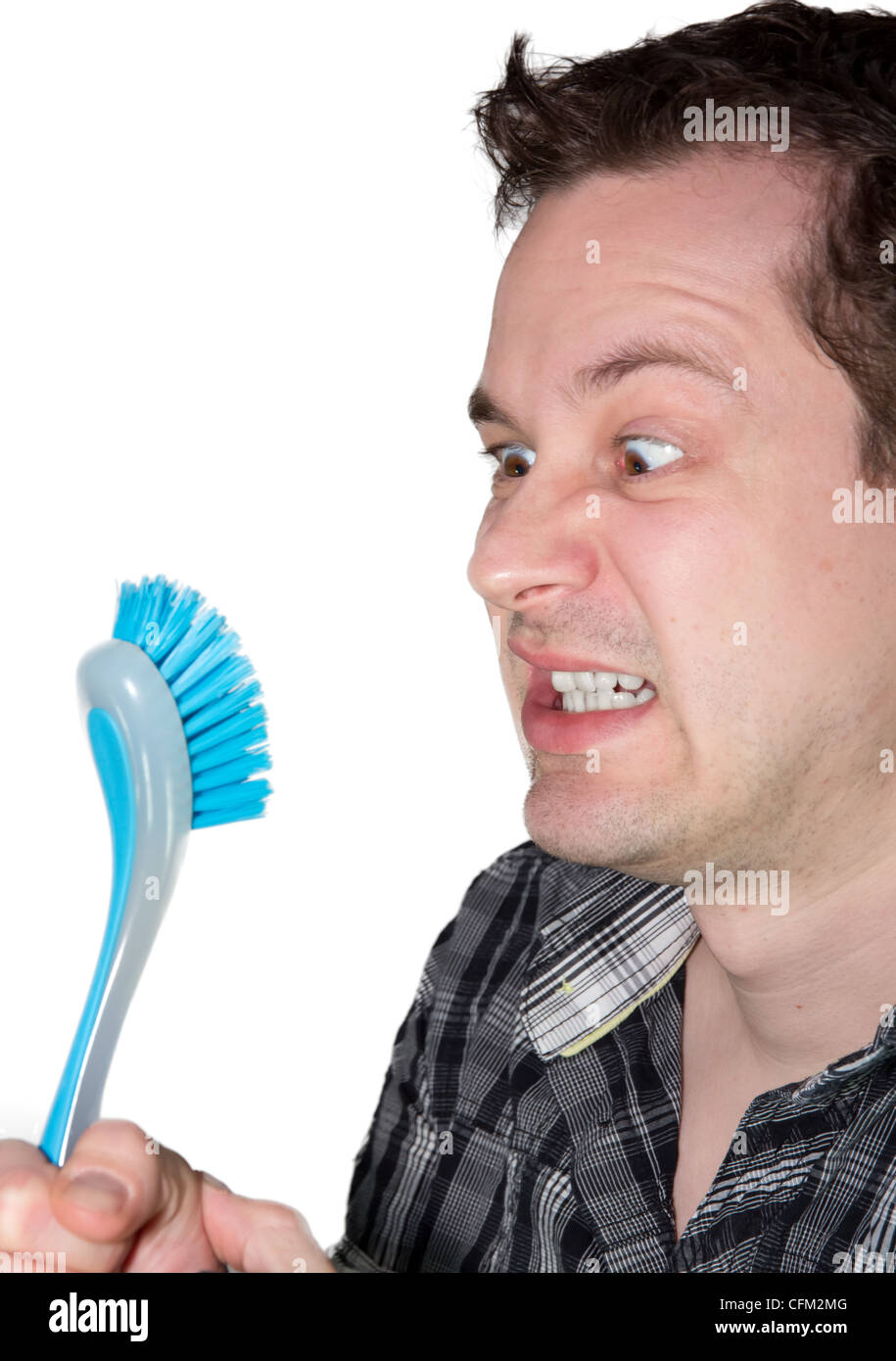 Picture of a man that hate to do the dishes Stock Photo