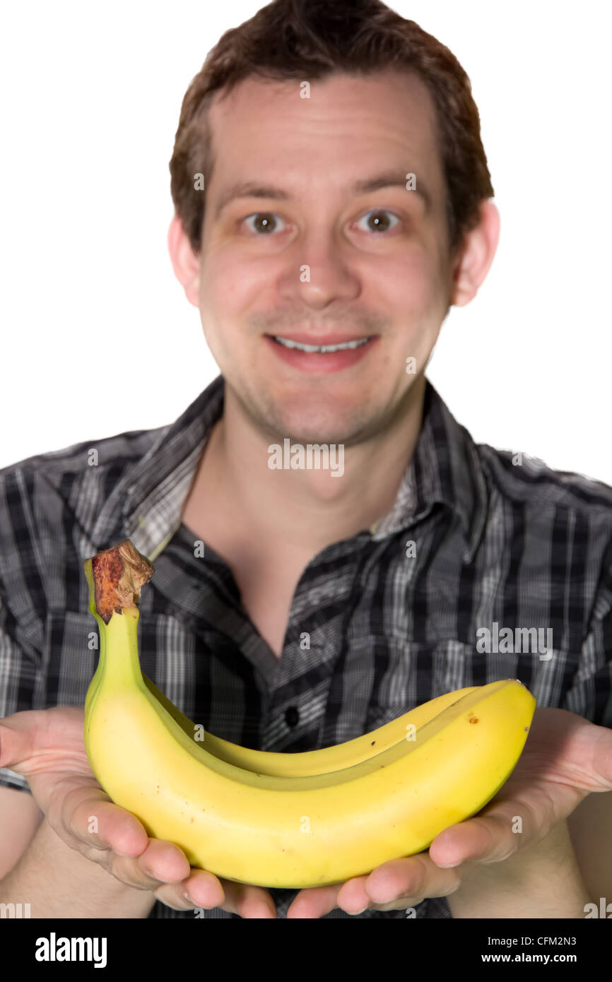 Picture of a man giving a banana to someone Stock Photo Alamy