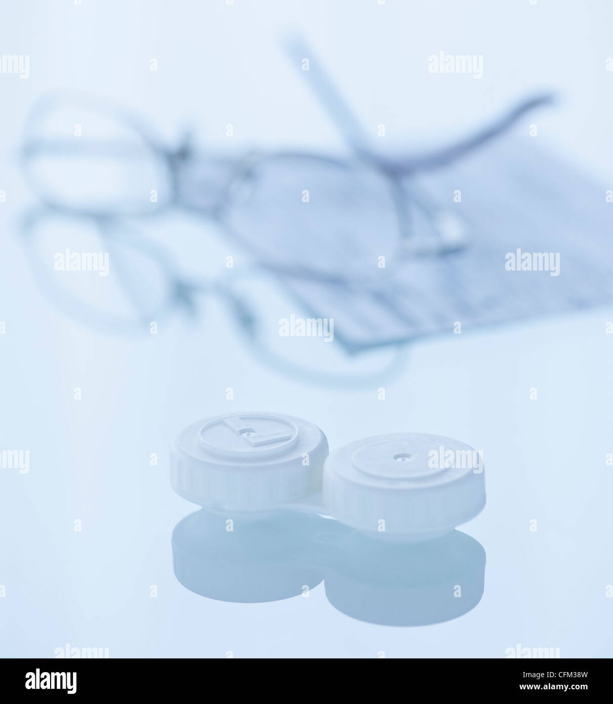 Studio shot of contact lens and spectacles Stock Photo