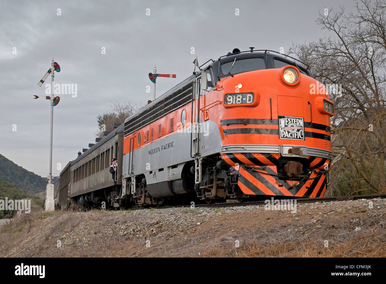 Western Pacific locomotive 918D pulls a set of passenger cars past the ...