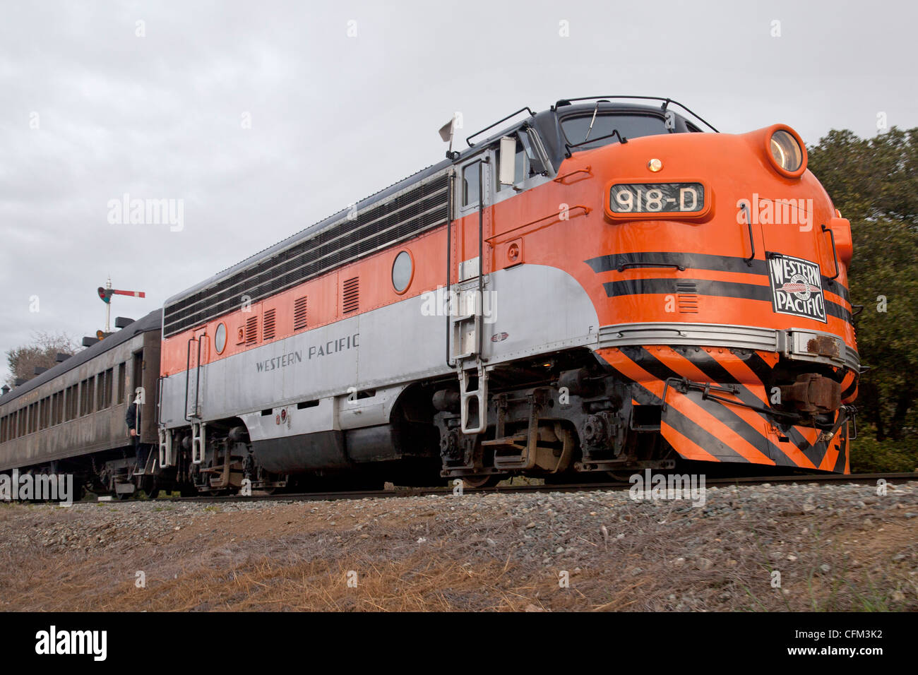 Western Pacific locomotive 918D pulls a set of passenger cars past the ...