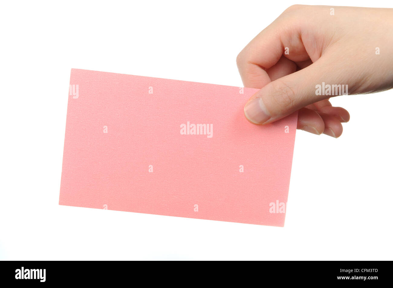 Empty pink business card in a woman's hand Stock Photo