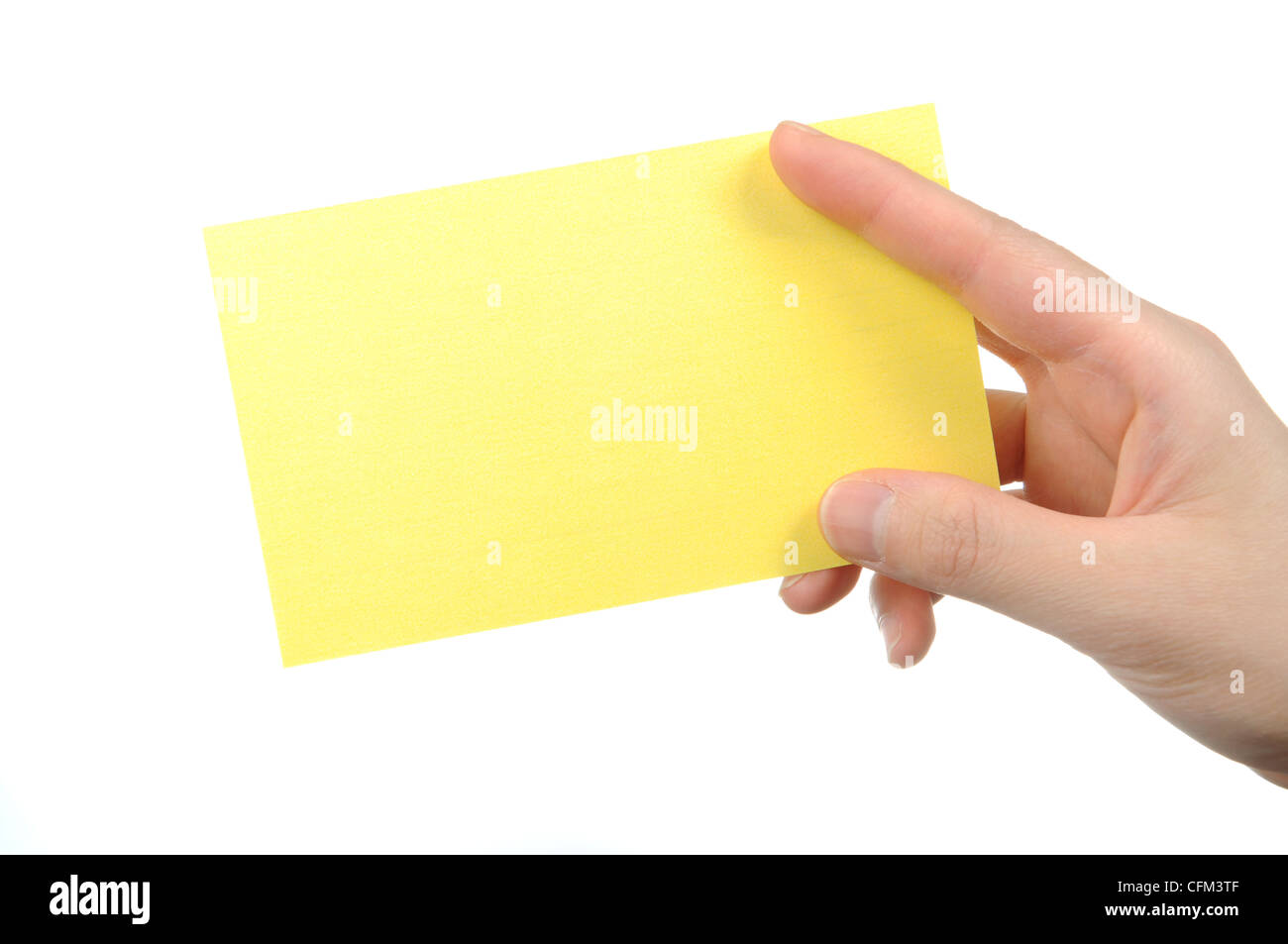 Empty pink business card in a woman's hand Stock Photo