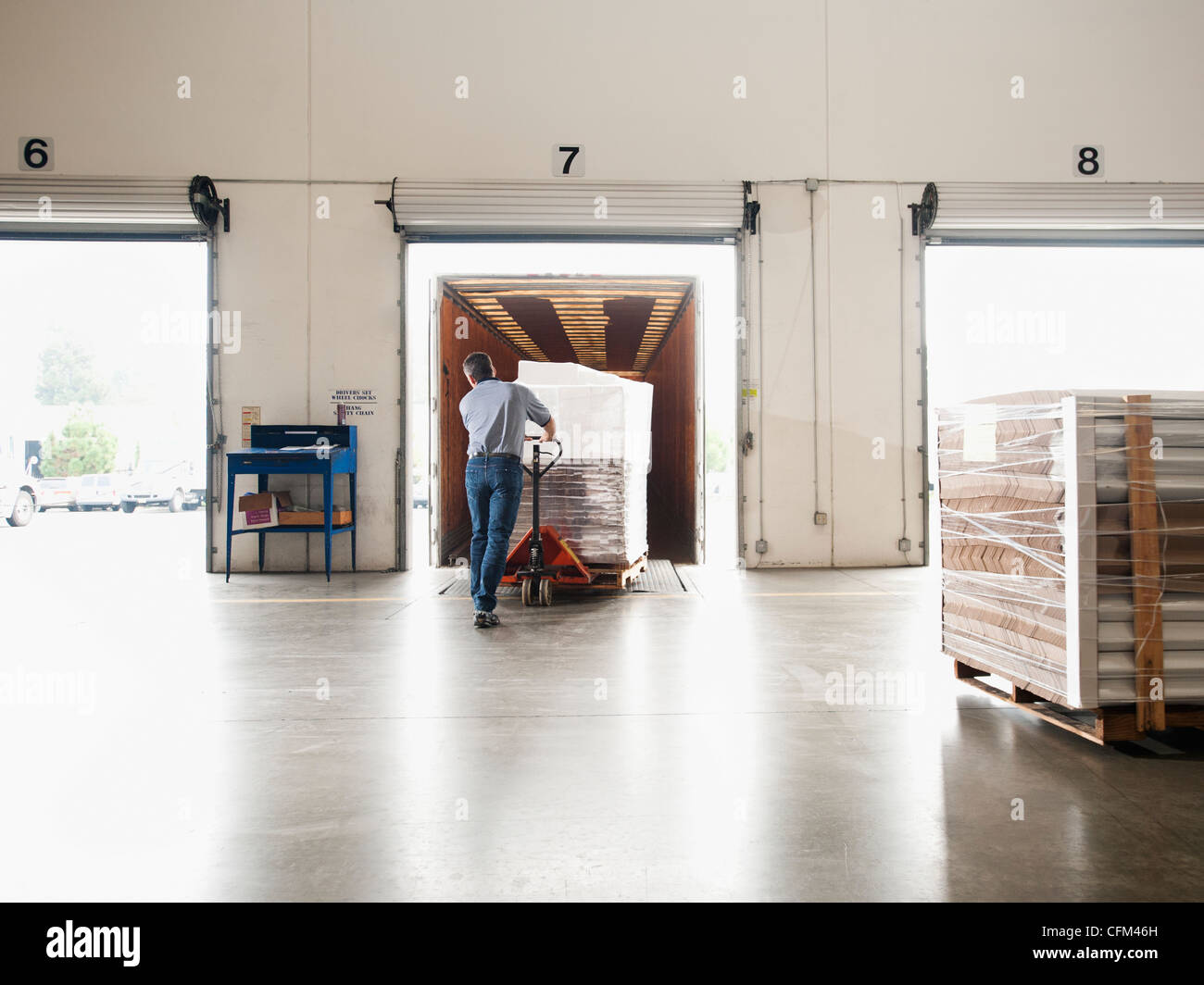 USA, California, Santa Ana, Man working in warehouse Stock Photo Alamy