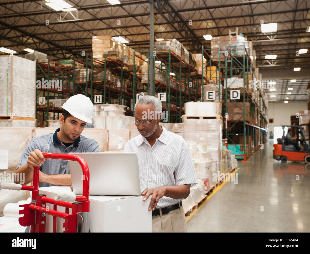 USA, California, Santa Ana, Men working in warehouse Stock Photo Alamy