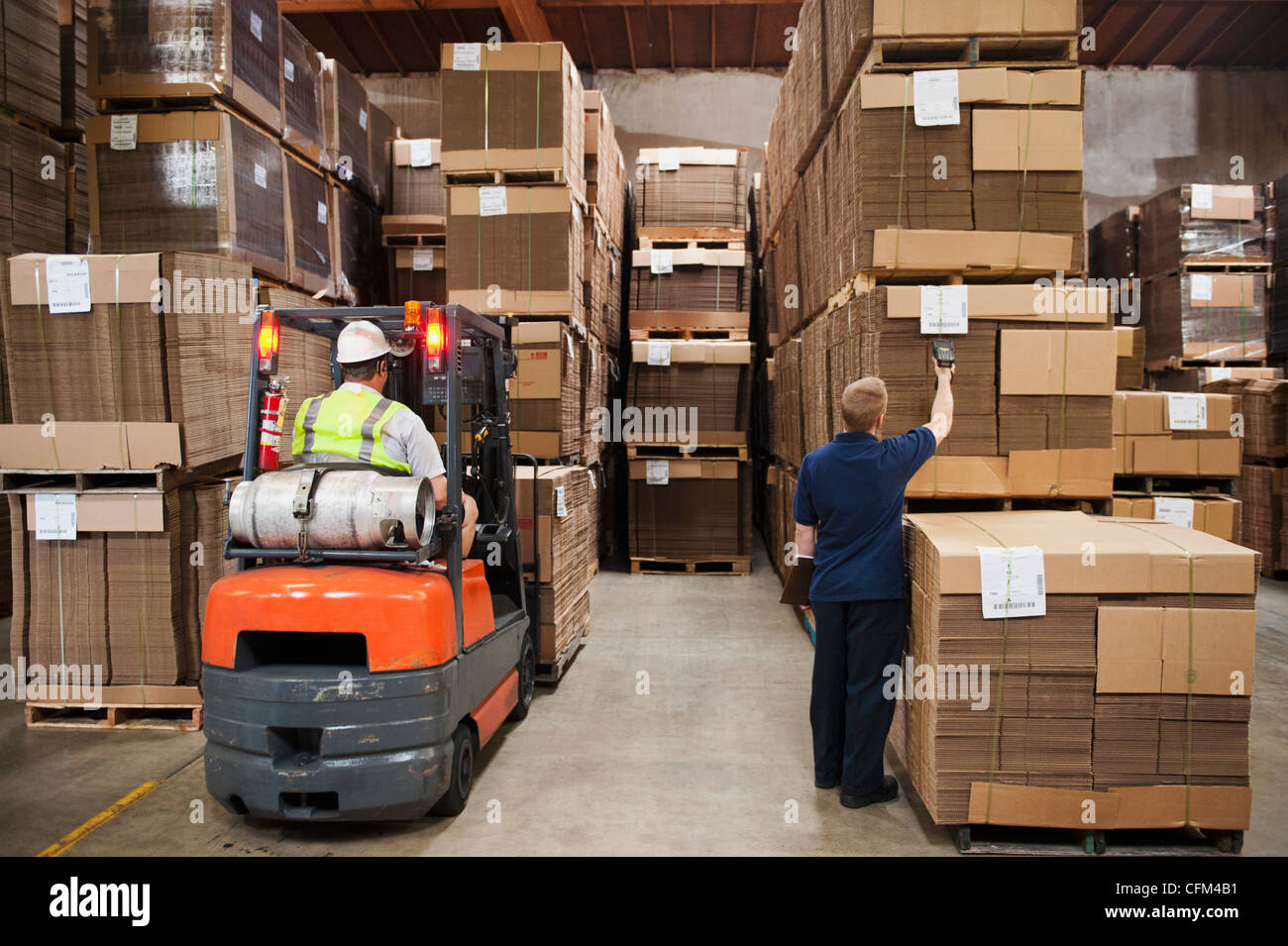 USA, California, Santa Ana, People working in warehouse Stock Photo Alamy