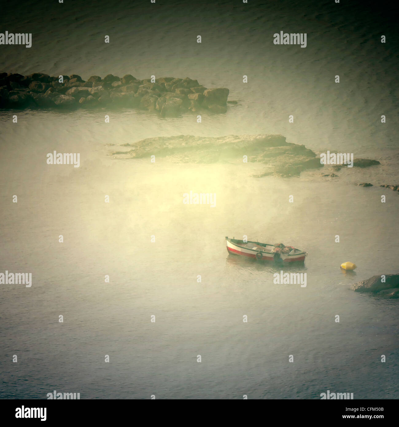 small fishing boat in a bay Stock Photo