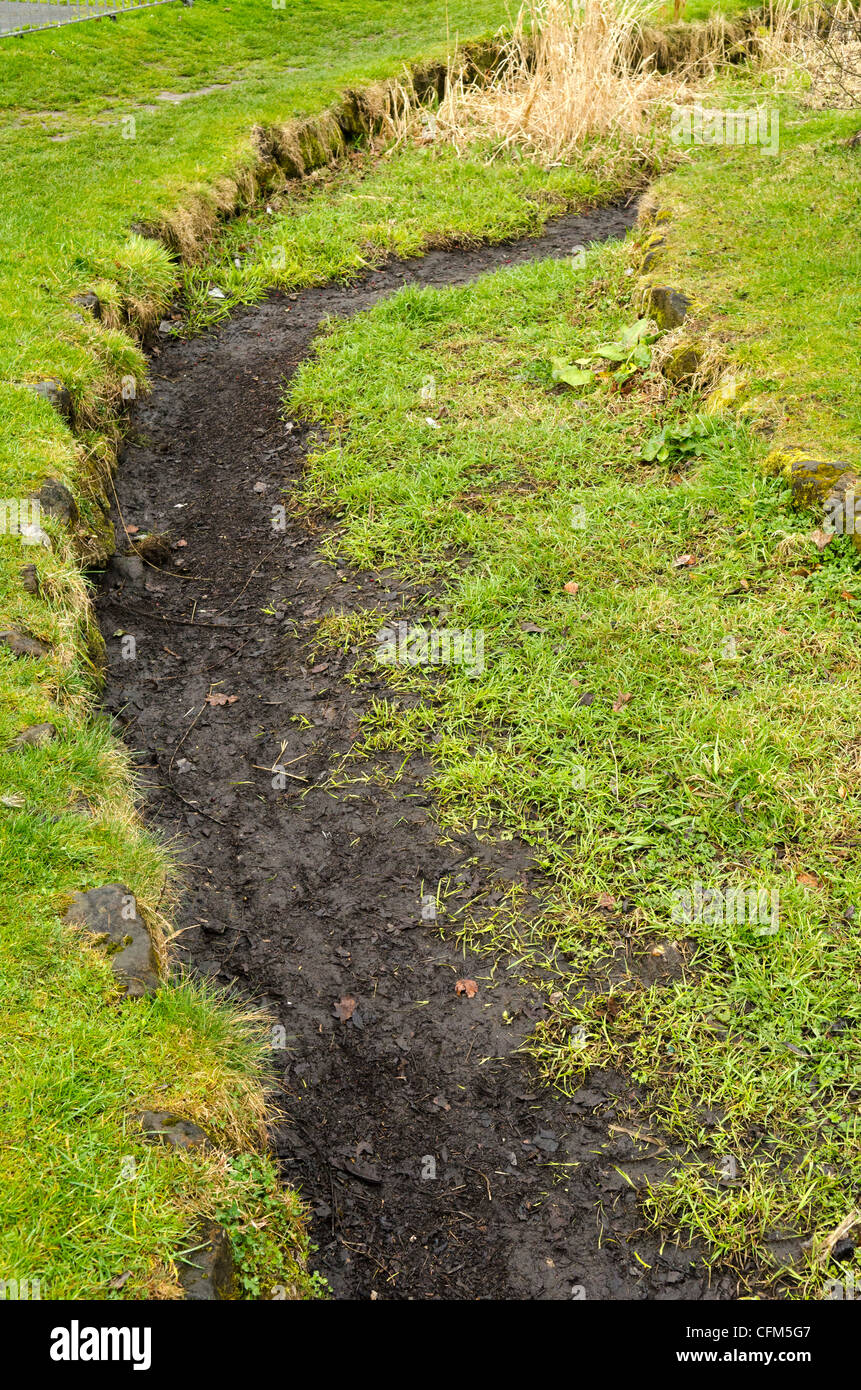 dried up river bed in drought conditions River Misbourne Chalfont St Giles Bucks UK Stock Photo