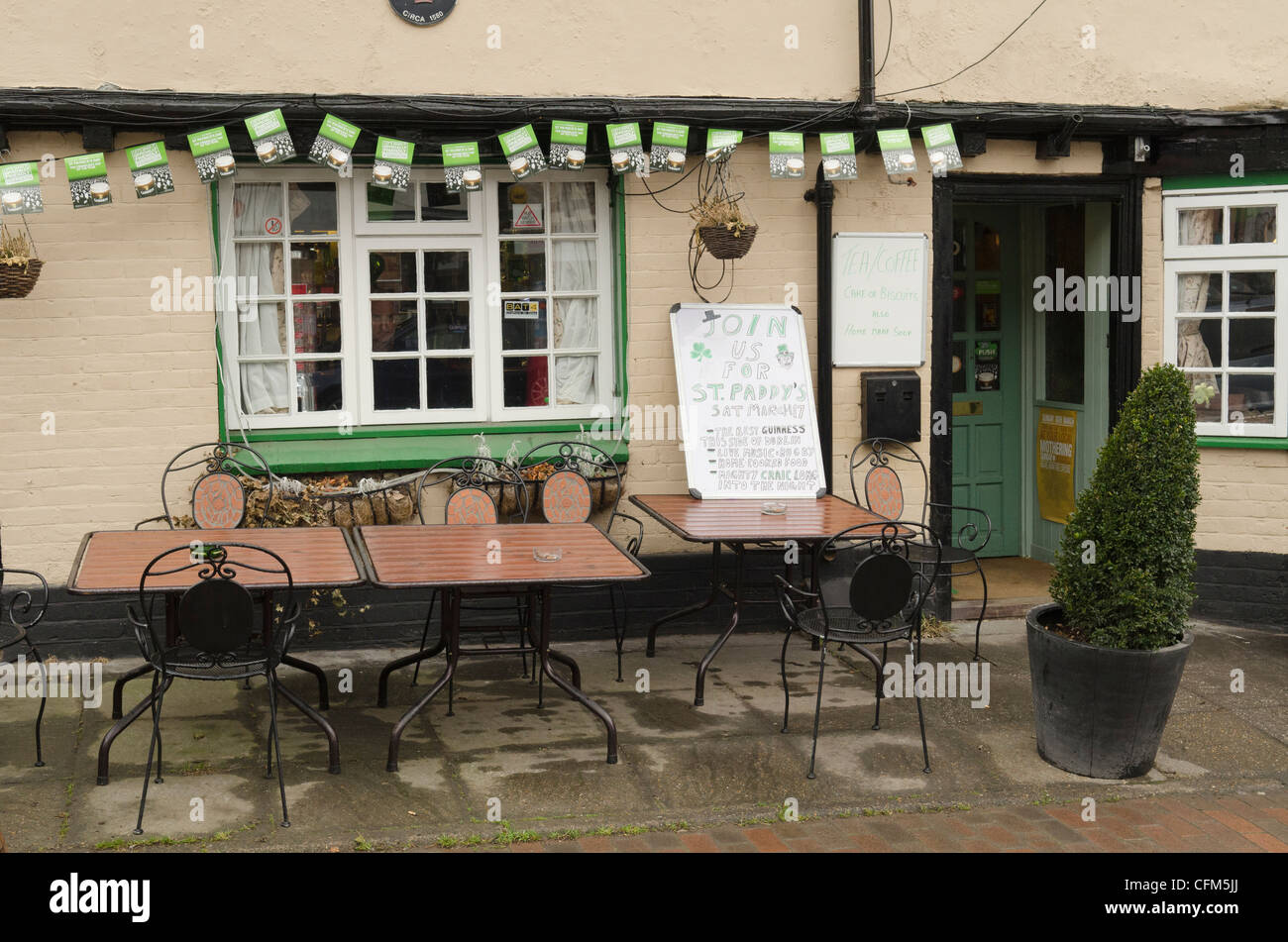 St Patrick's day decorations outside a pub in Chalfont St Giles Bucks UK. Stock Photo