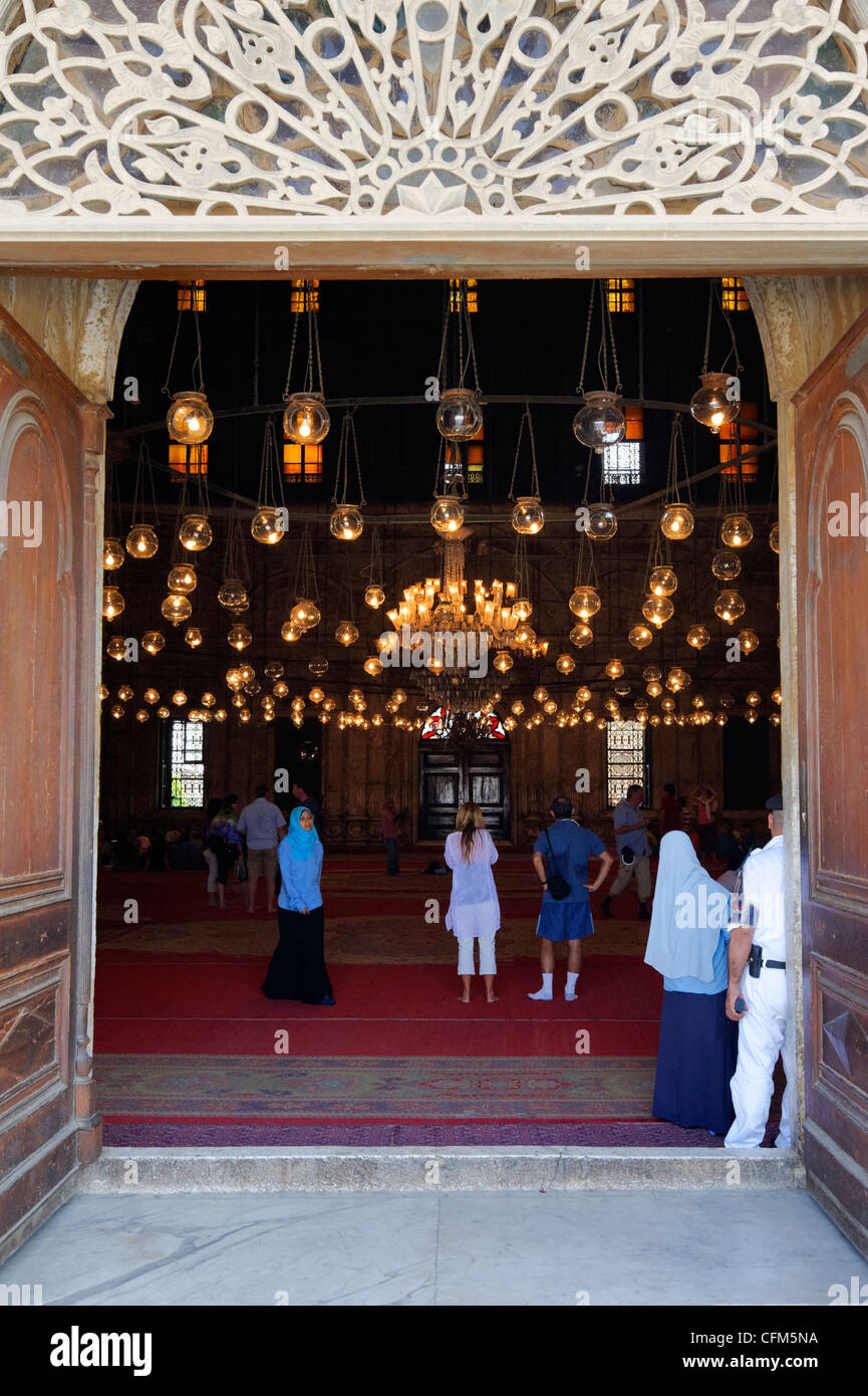 Cairo. Egypt. View of the hanging globe lamps and chandeliers opulently decorated ceiling and large interior of the Ottoman Stock Photo