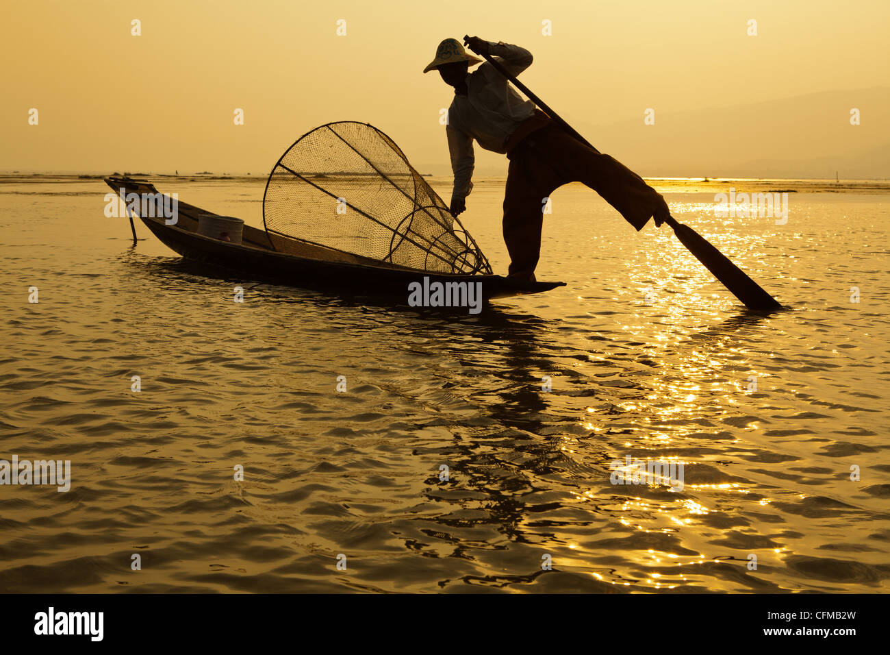 Intha people who live on and around Inle Lake get around by using ...