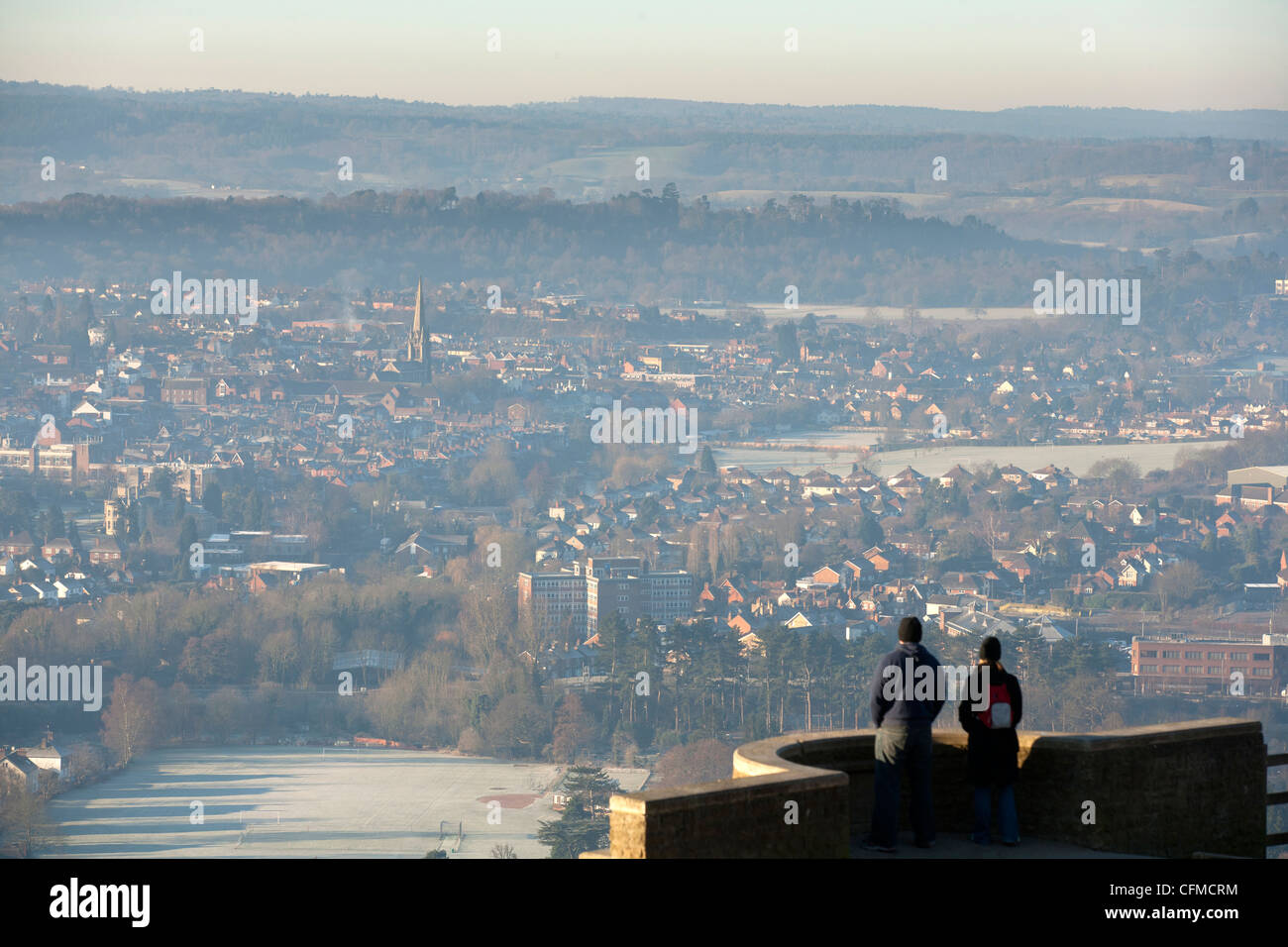 Two people looking at winter view of Dorking from Box Hill viewpoint, Surrey Hills, Surrey, England, United Kingdom, Europe Stock Photo