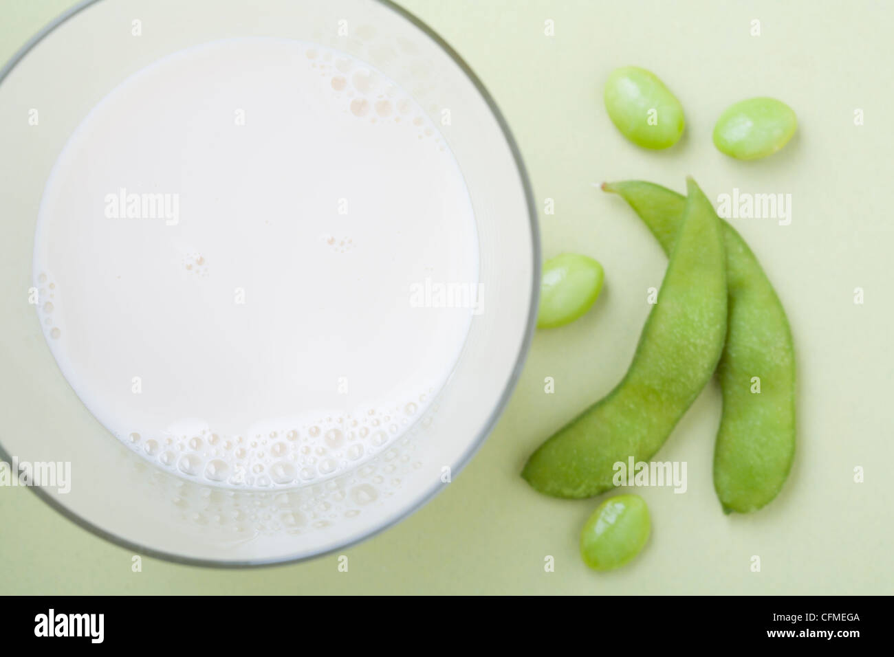 Soy milk and edamame, studio shot Stock Photo Alamy