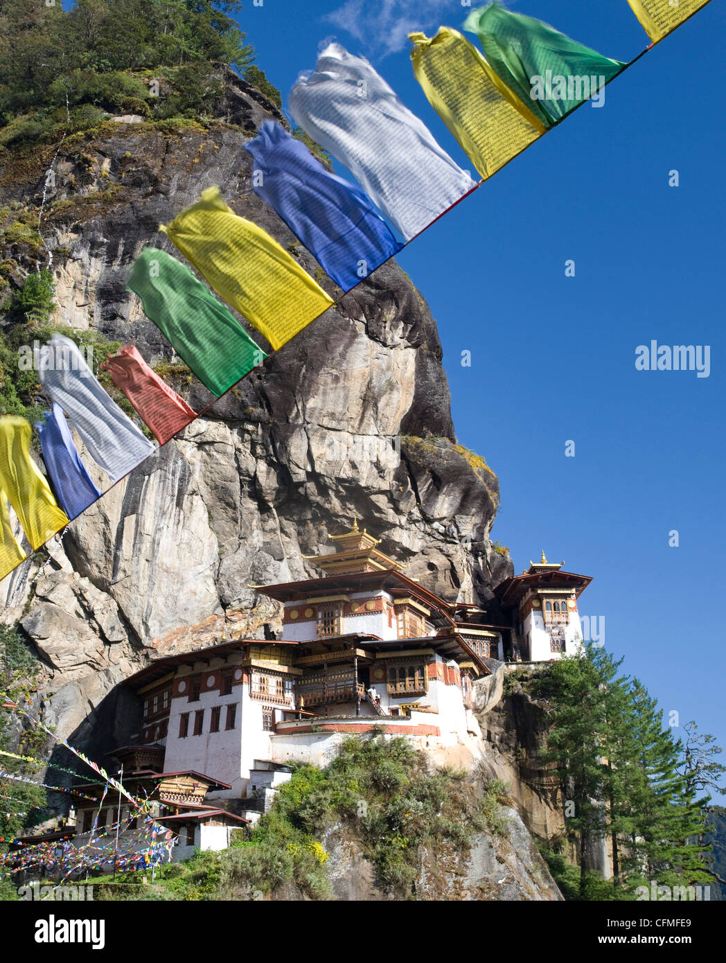 Taktshang Goemba (Tiger's Nest Monastery) and prayer flags, Paro Valley ...