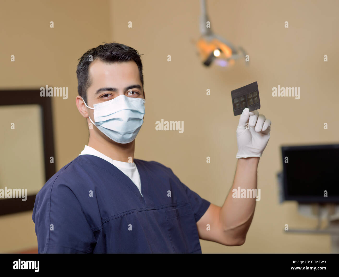 Canada, Alberta, Portrait of dentist holding xray Stock Photo Alamy