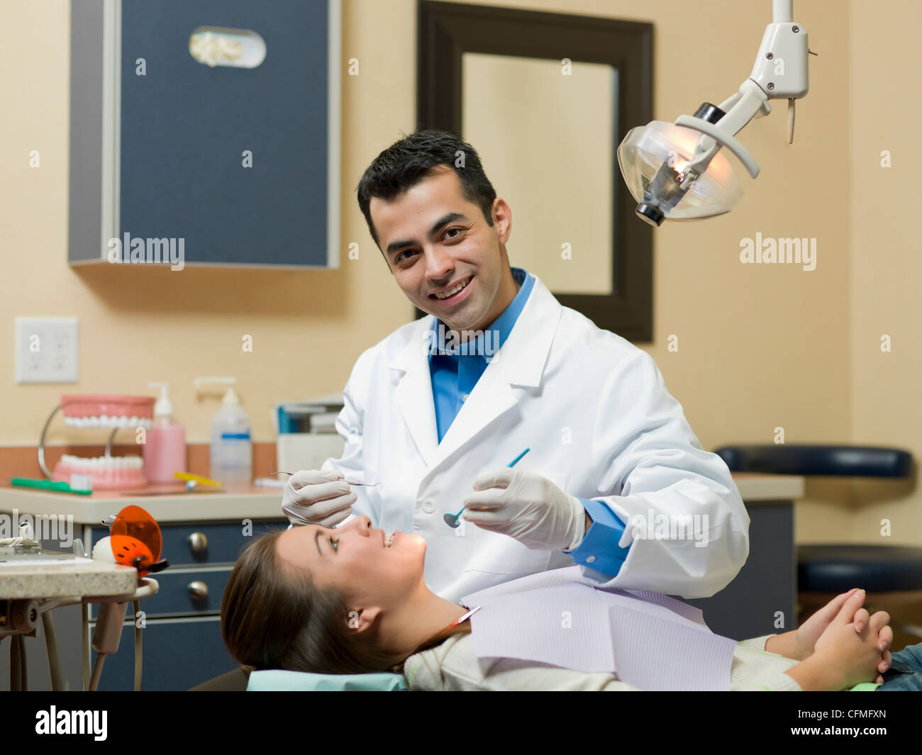 Canada, Alberta, Dentist and patient in dental surgery Stock Photo Alamy