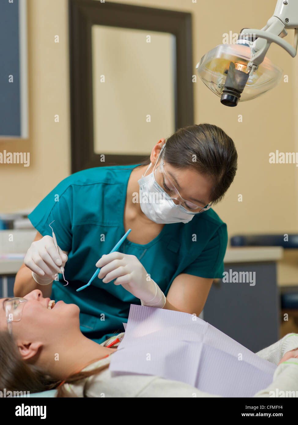 Canada, Alberta, Dentist and patient in dental surgery Stock Photo Alamy
