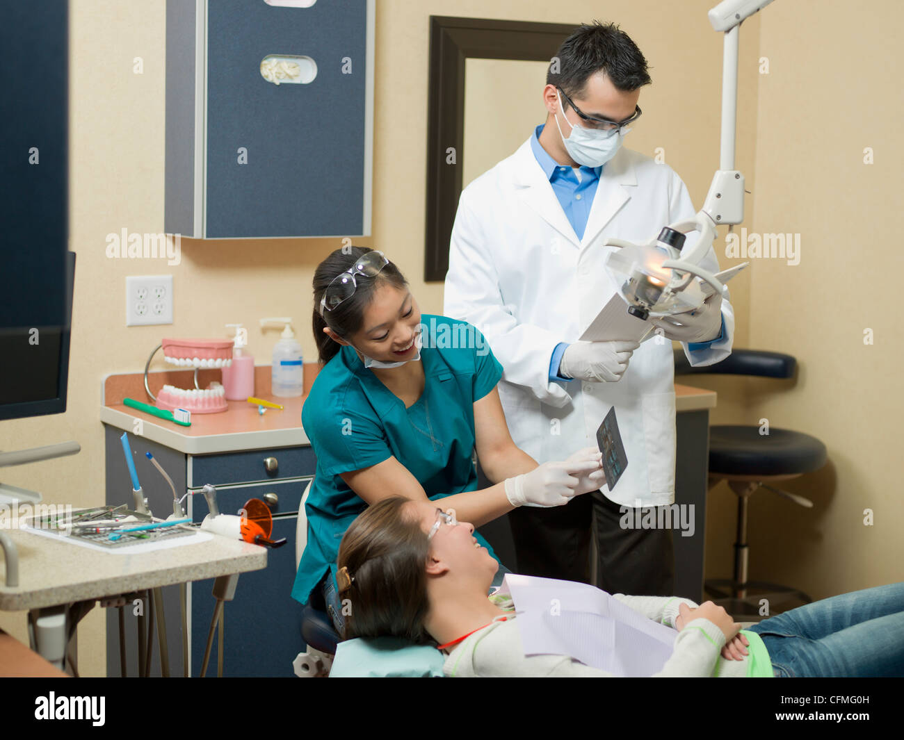 Canada, Alberta, Dentists and patient in dental surgery Stock Photo Alamy