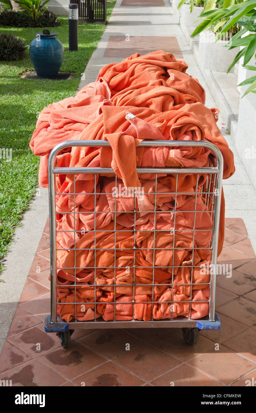 Trolley full of used towels at a hotel Stock Photo Alamy