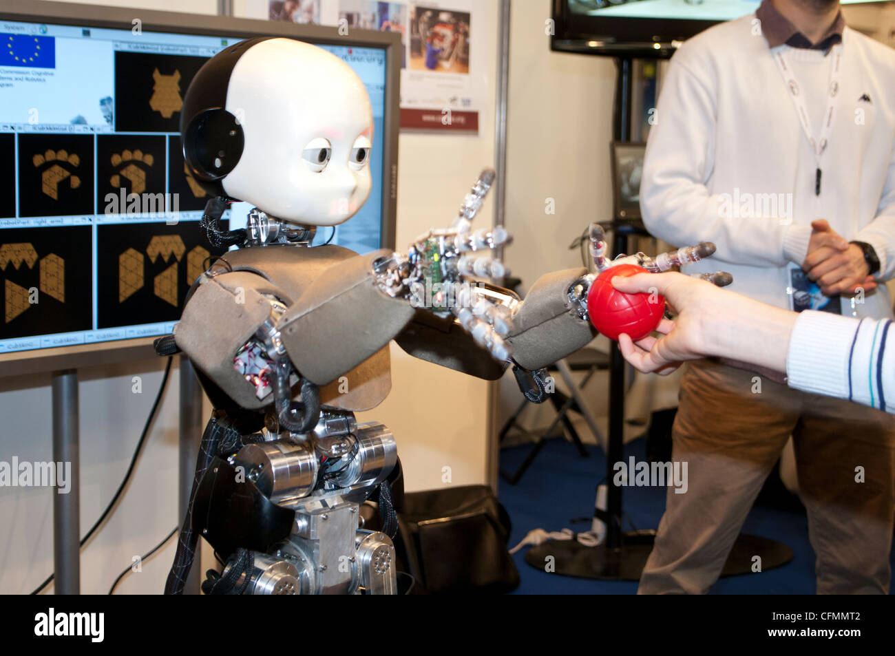 iCub robot from IIT (Italian Technology Institute) catchs a ball in  INNOROBO, International and European summit in robotics Stock Photo - Alamy