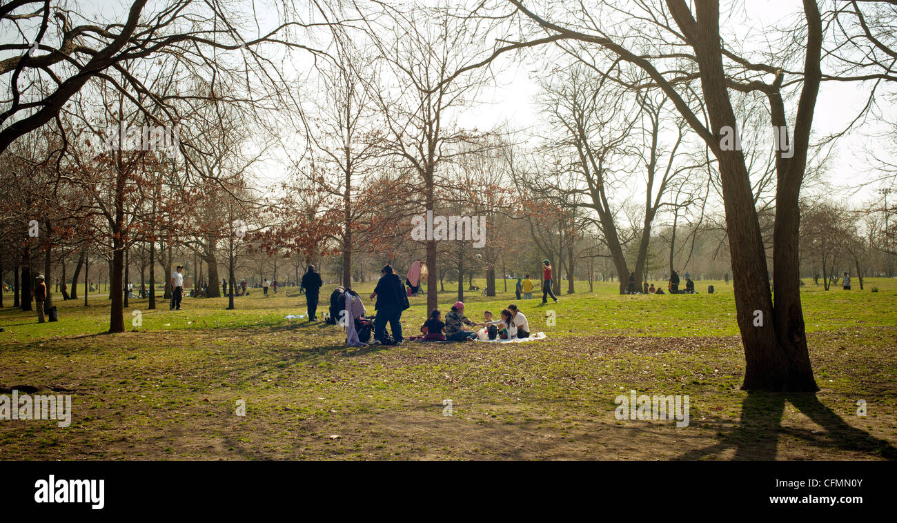 Visitors enjoy a warm day in Flushing Meadows Park in Queens in New York on Sunday, March 18, 2012 Stock Photo