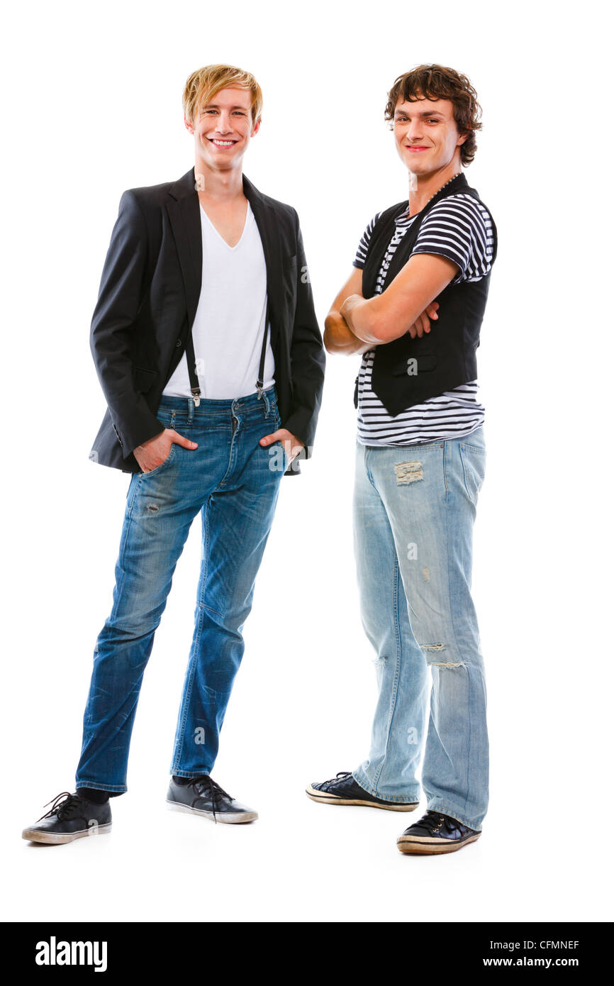 Portrait of two smiling young men with crossed arms Stock Photo
