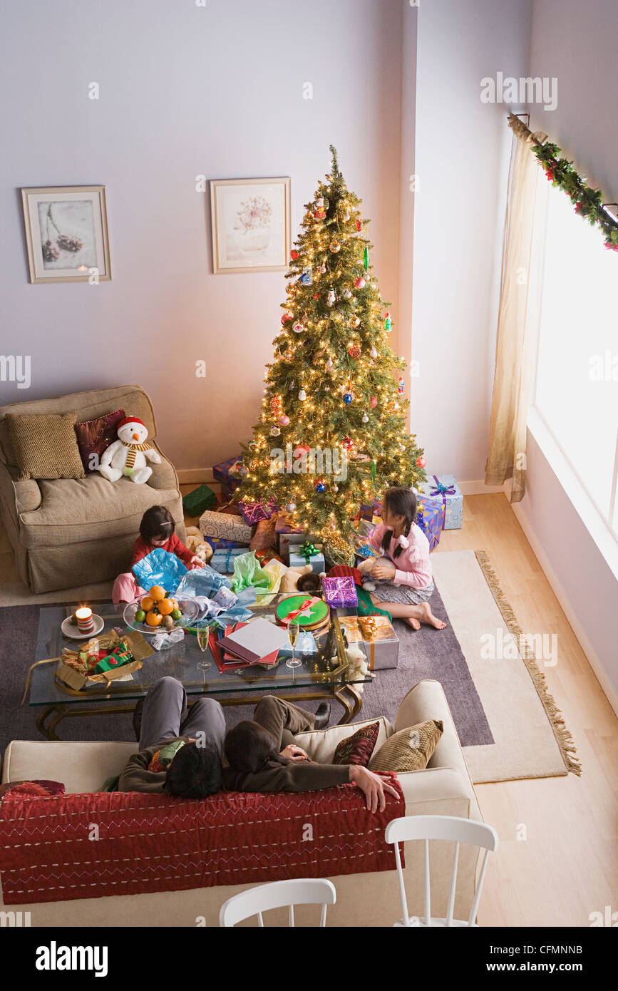 USA, California, Los Angeles, Family with two daughters (10-11) at Christmas morning Stock Photo