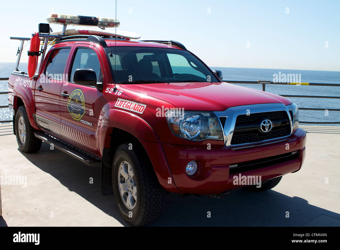 Red Toyota  lifeguard truck on Huntington Beach pier California USA Stock Photo
