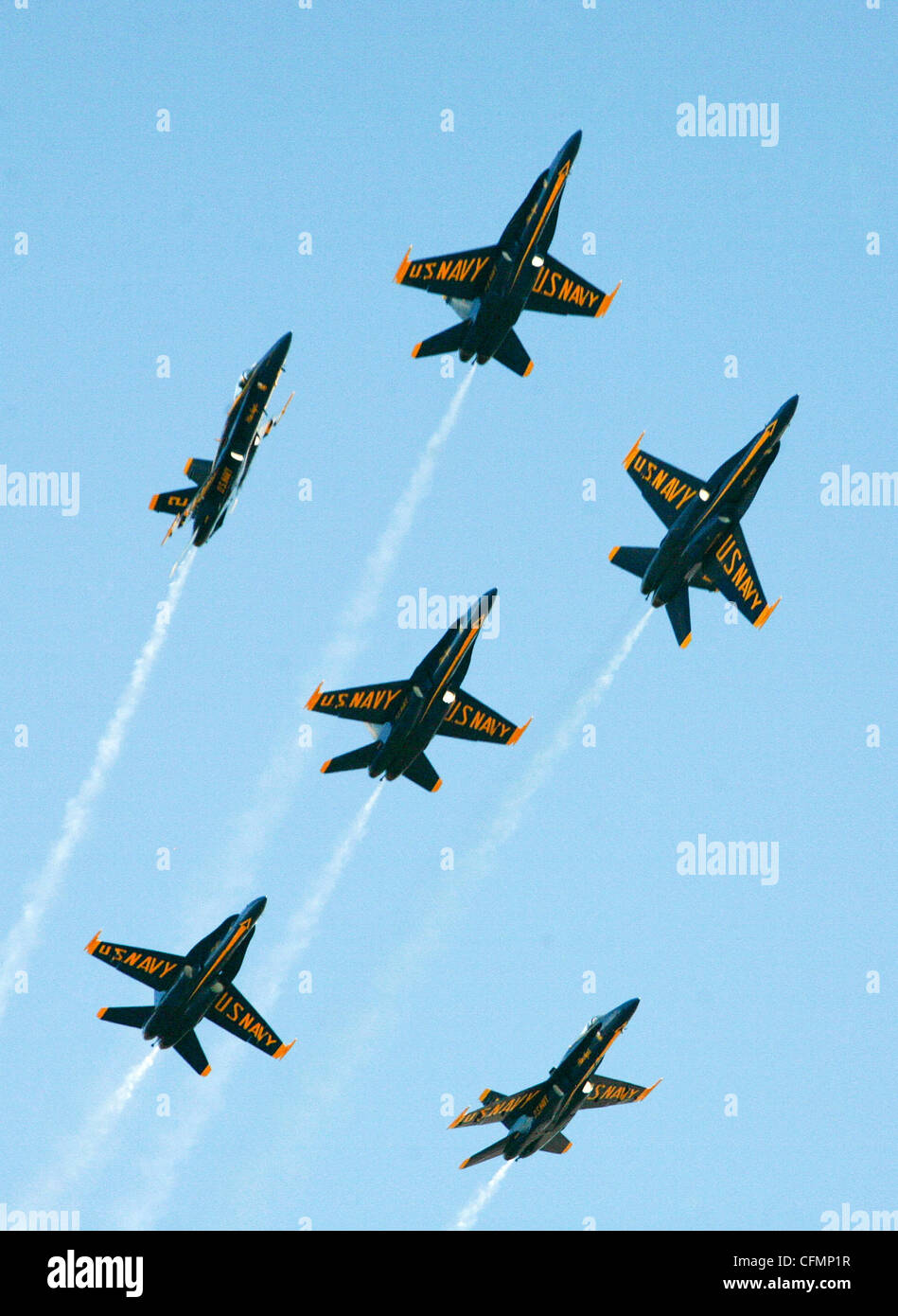 The U.S. Navy Blue Angels split their formation over Marine Corps Air Station Miramar during a performance at the Miramar Air Show Oct. 2, 2011. The Blue Angels are celebrating their 65th anniversary of dazzling air show crowds and saluting 100 years of naval aviation. Stock Photo