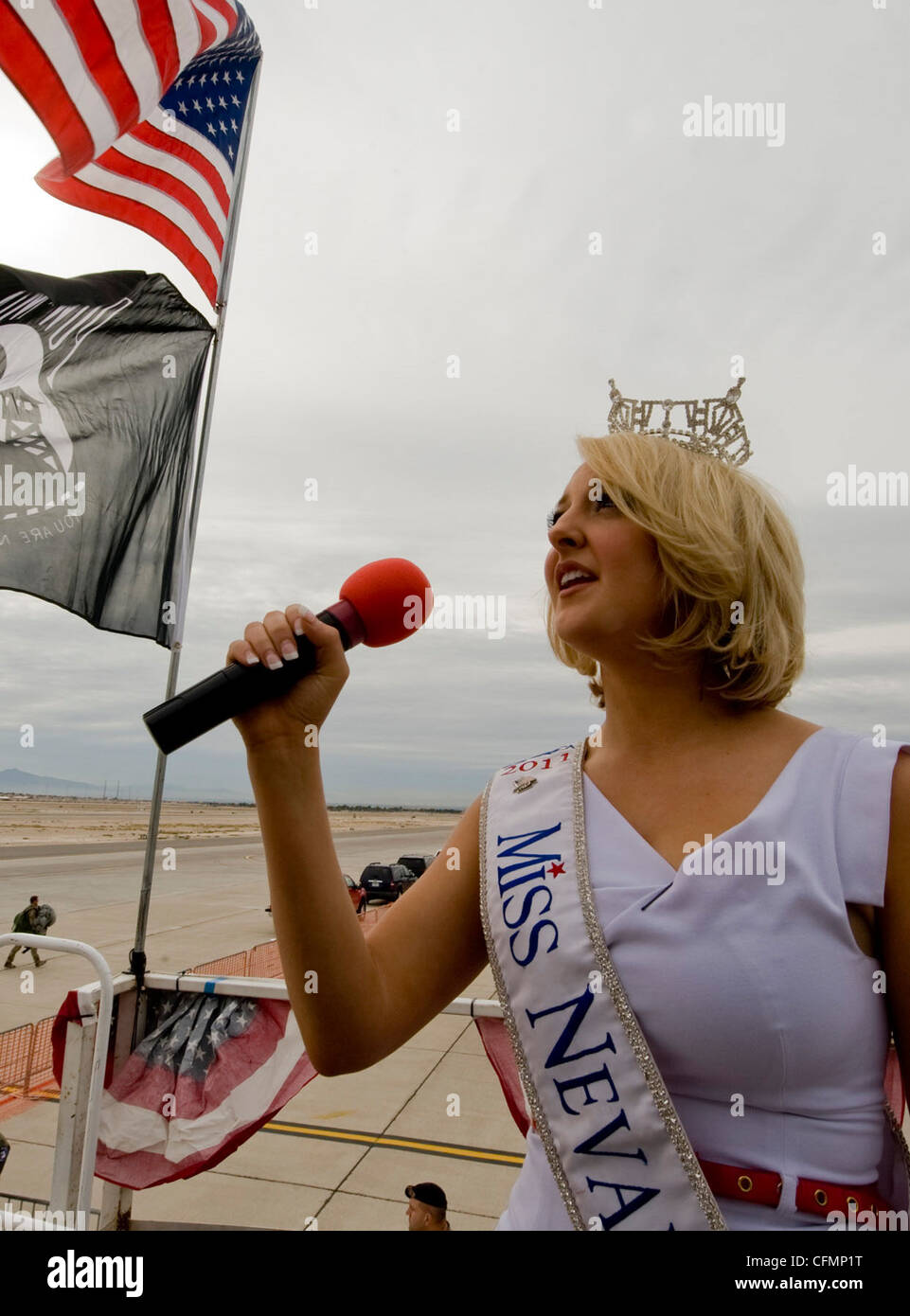 Alana Lee, Miss Nevada 2011, sings the national anthem during the opening  ceremony of the 2011 Aviation Nation Open House, Nov. 11, at Nellis Air  Force Base, Nev. Aviation Nation celebrates 70