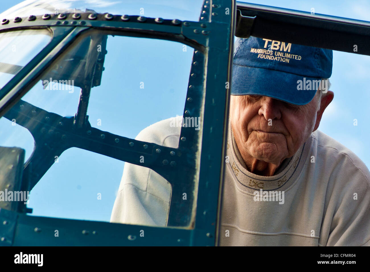 U.S. Marine Corps retired Lt. Col. Harry Ziegler looks at his restored Grumman Avenger during the 2011 Aviation Nation Open House, Nov. 11, at Nellis Air Force Base, Nev. Aviation Nation celebrates 70 years of airpower in Las Vegas and the Air Force's accomplishments in air, space and cyberspace. ( Stock Photo