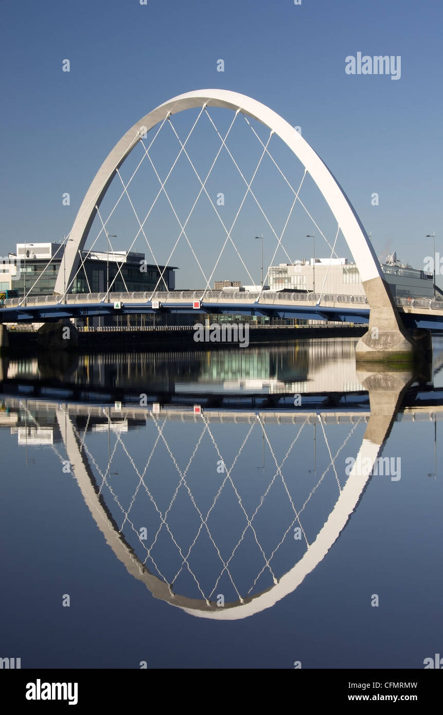 Squinty, or Clyde Arc, Bridge in central Glasgow spans the River Clyde at Finnieston on a sunny day with blue skies. Stock Photo