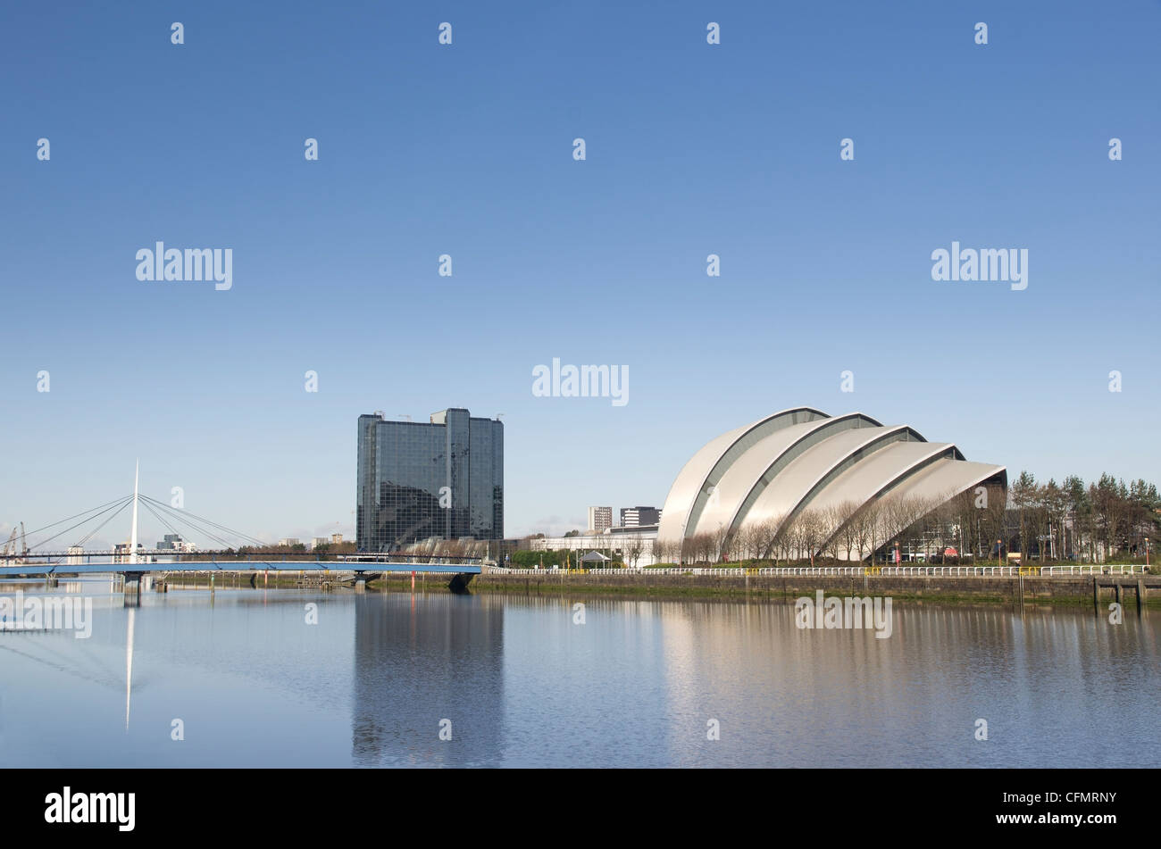 River Clyde in Glasgow with bridge, auditorium and modern buildings in