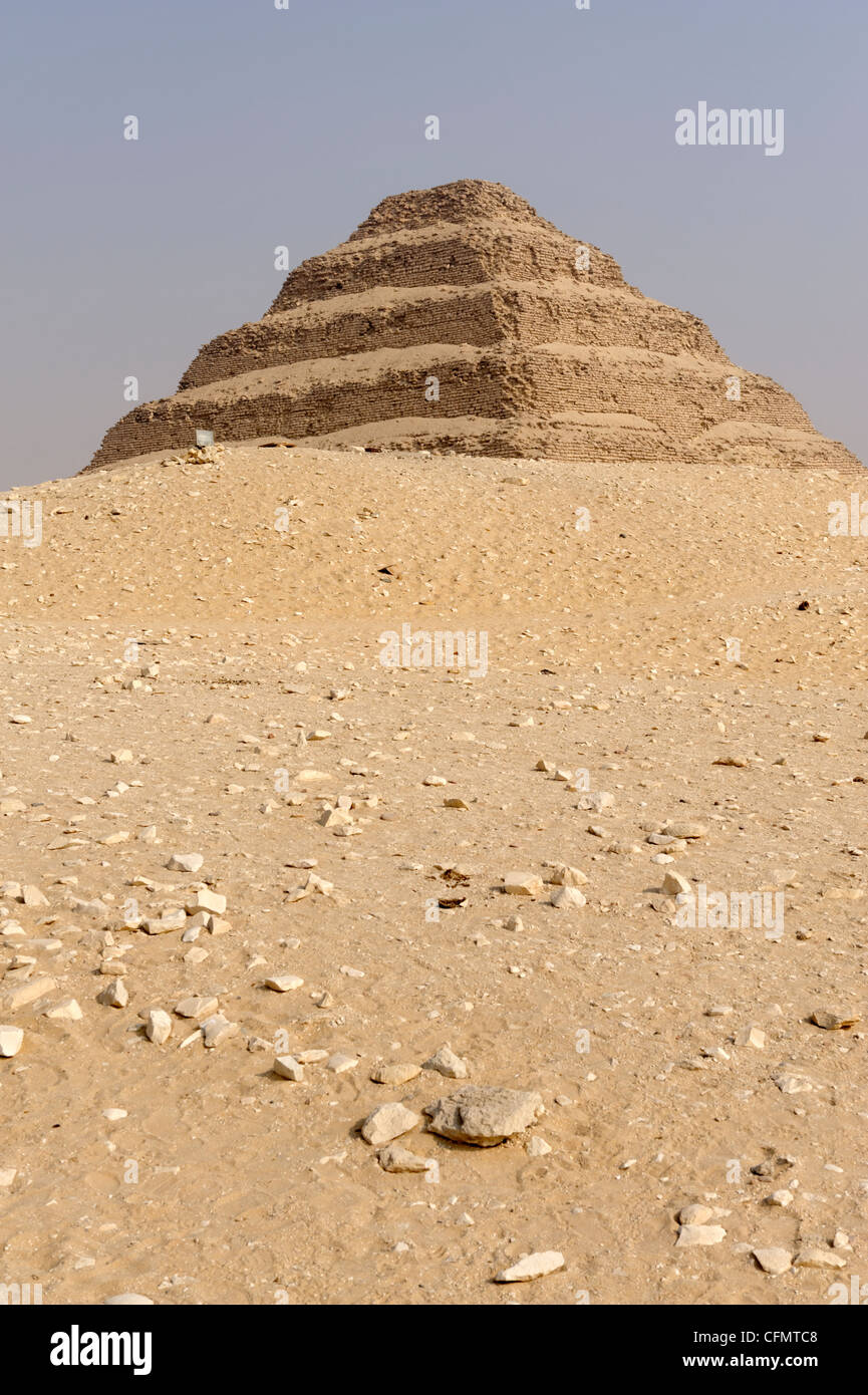 Saqqara. Egypt. View of the step pyramid of Djoser at the royal necropolis complex of Saqqara. Pharaoh King Djoser is Stock Photo