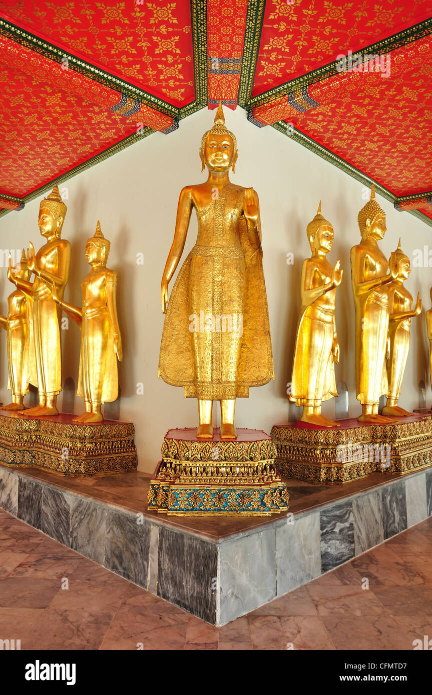Golden Buddha image in wat pho Stock Photo